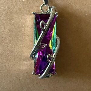 Radiant Blue Sapphire Necklace with Intricate Silver Detailing